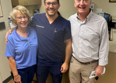 Sharon Fischer, Dr. Eric Tannenbaum, and Dr. Douglas Federle at Total Joint Day 2026